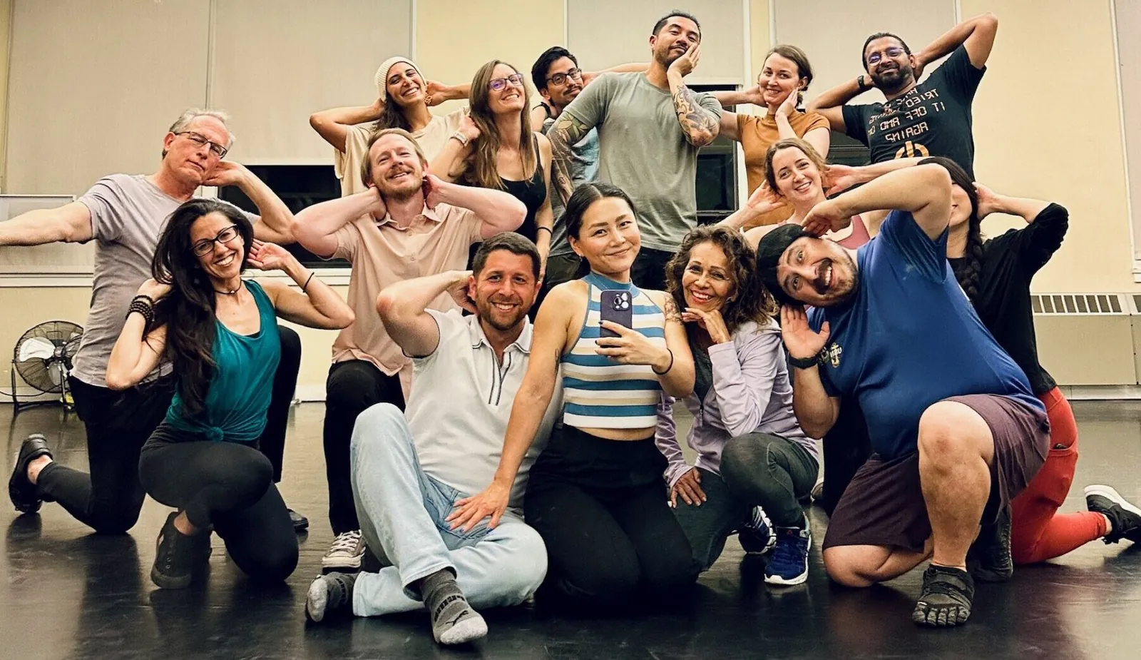 Kizzire dancers striking a pose together in the studio